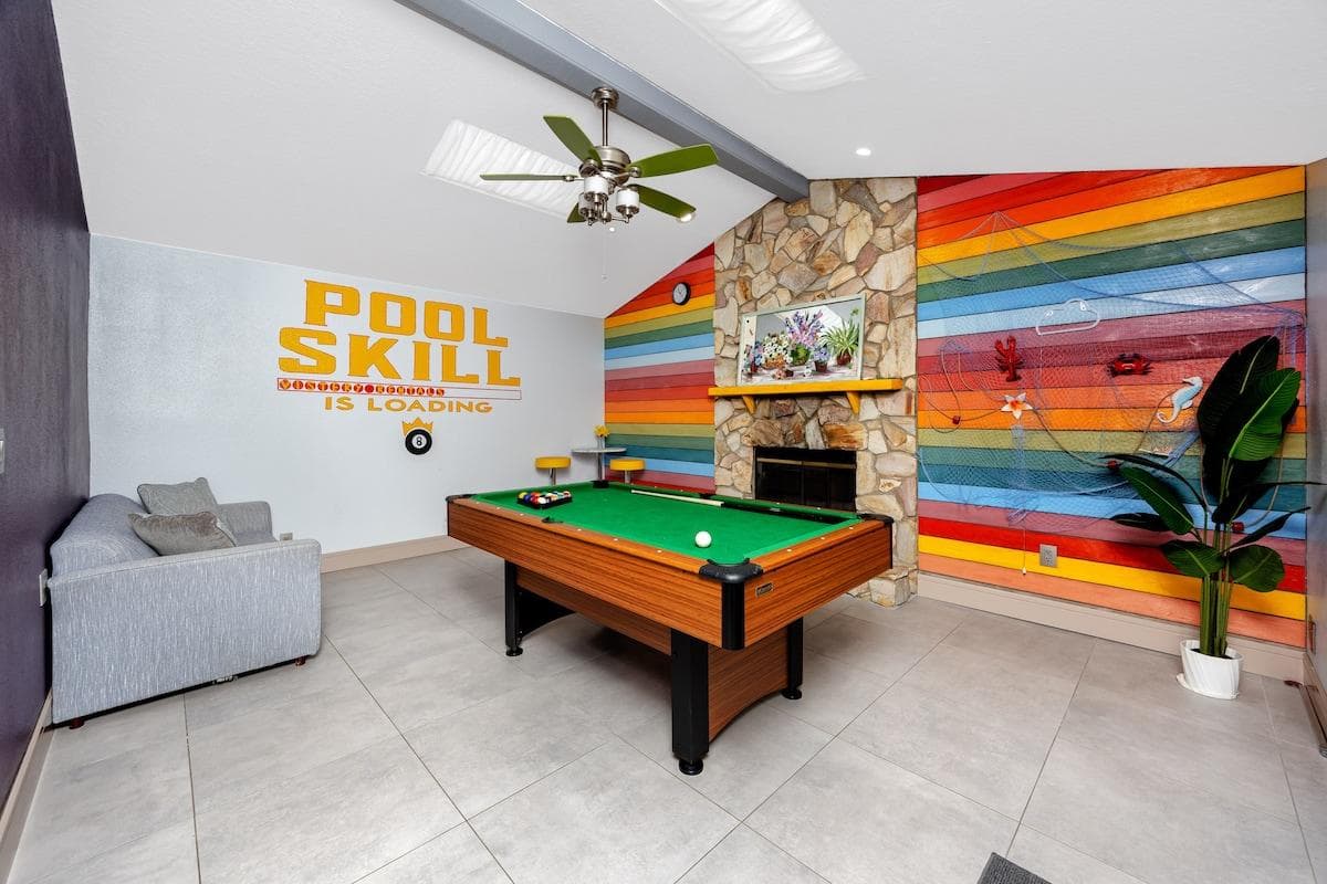 Show off your pool skills in our colorful game room! Guests can relax on the sofa bed or bar stools while cheering you on.